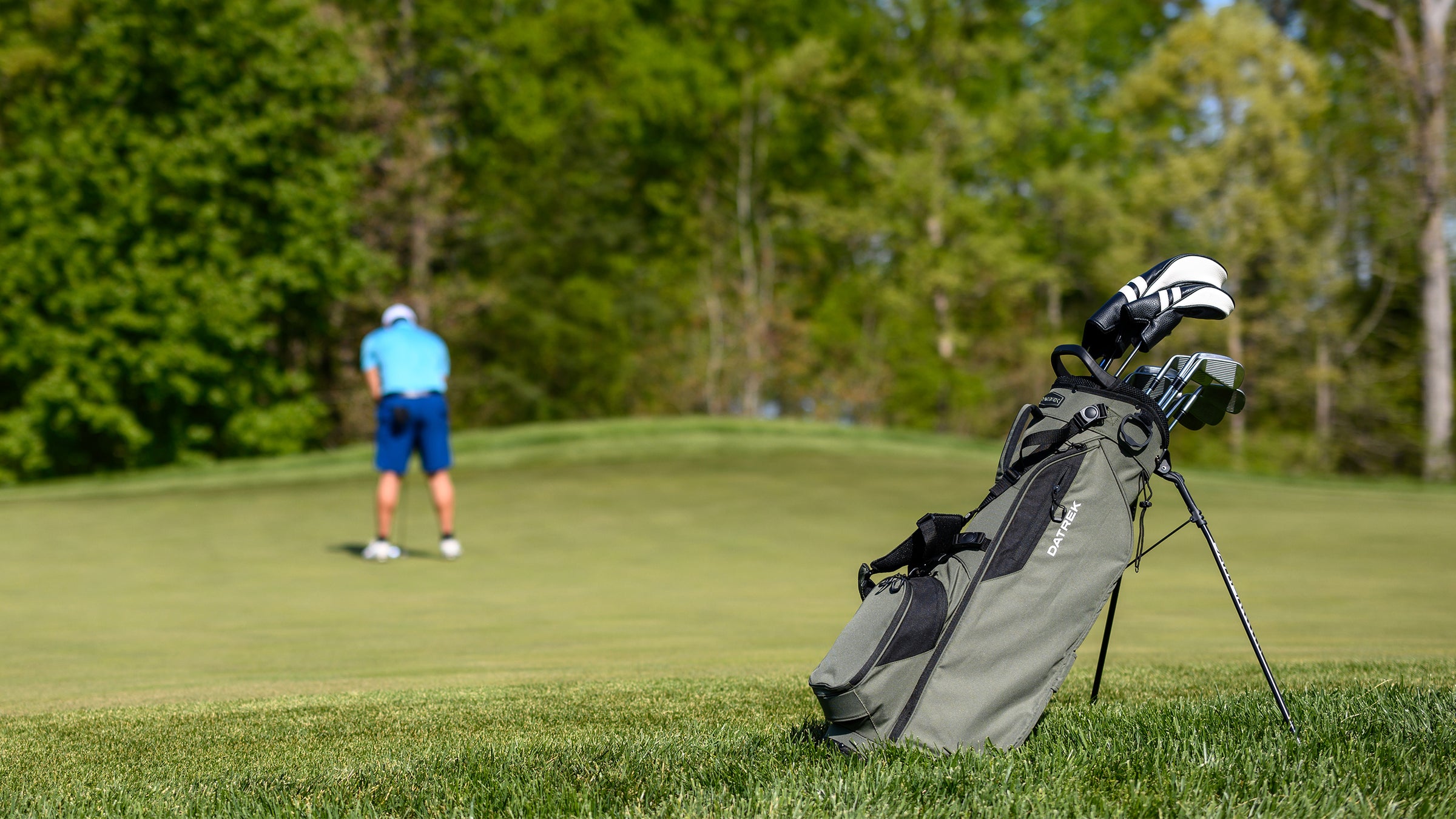 Person Playing Golf with a Datrek Golf Bag