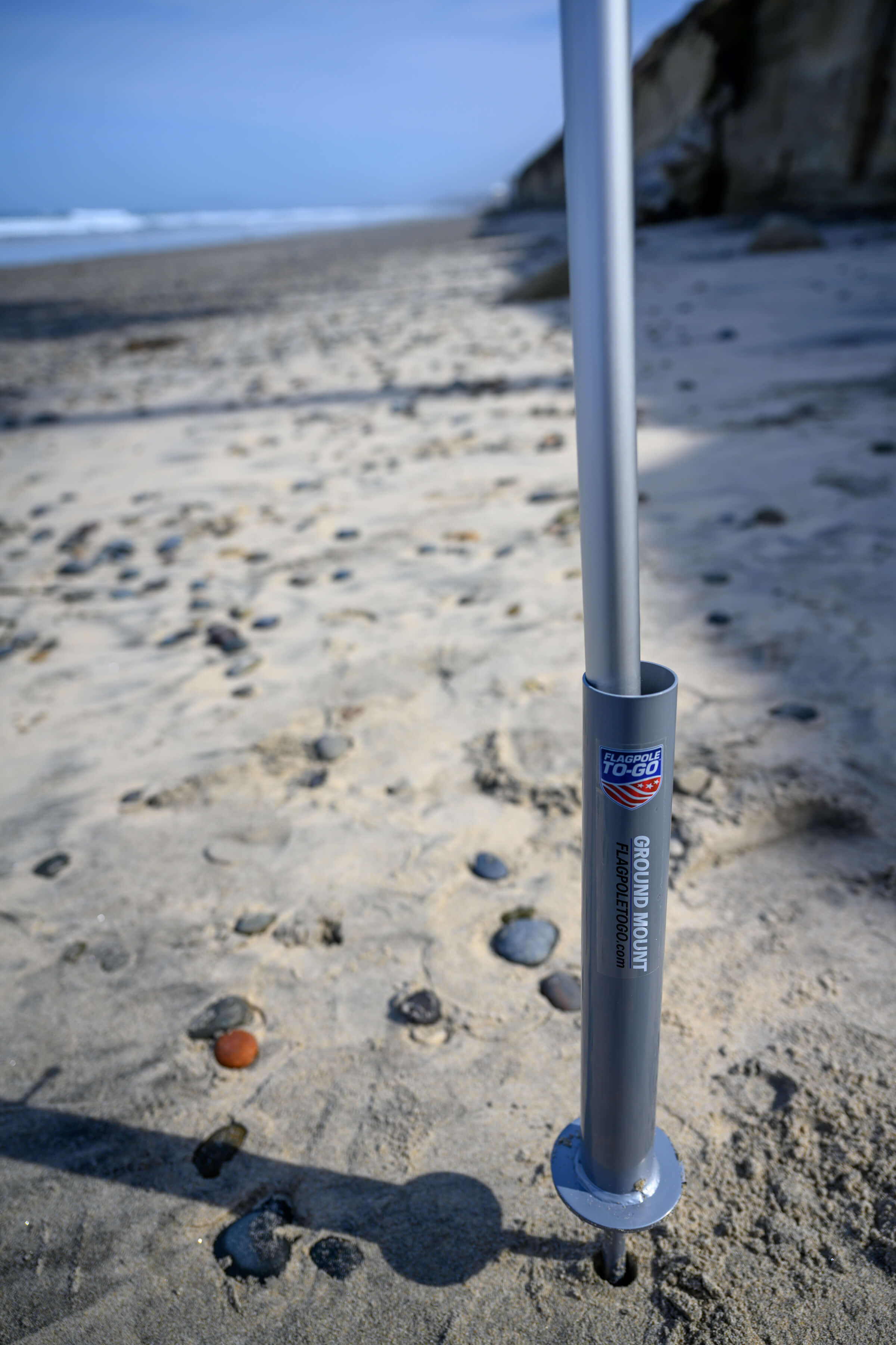 flagpole ground mount in sand