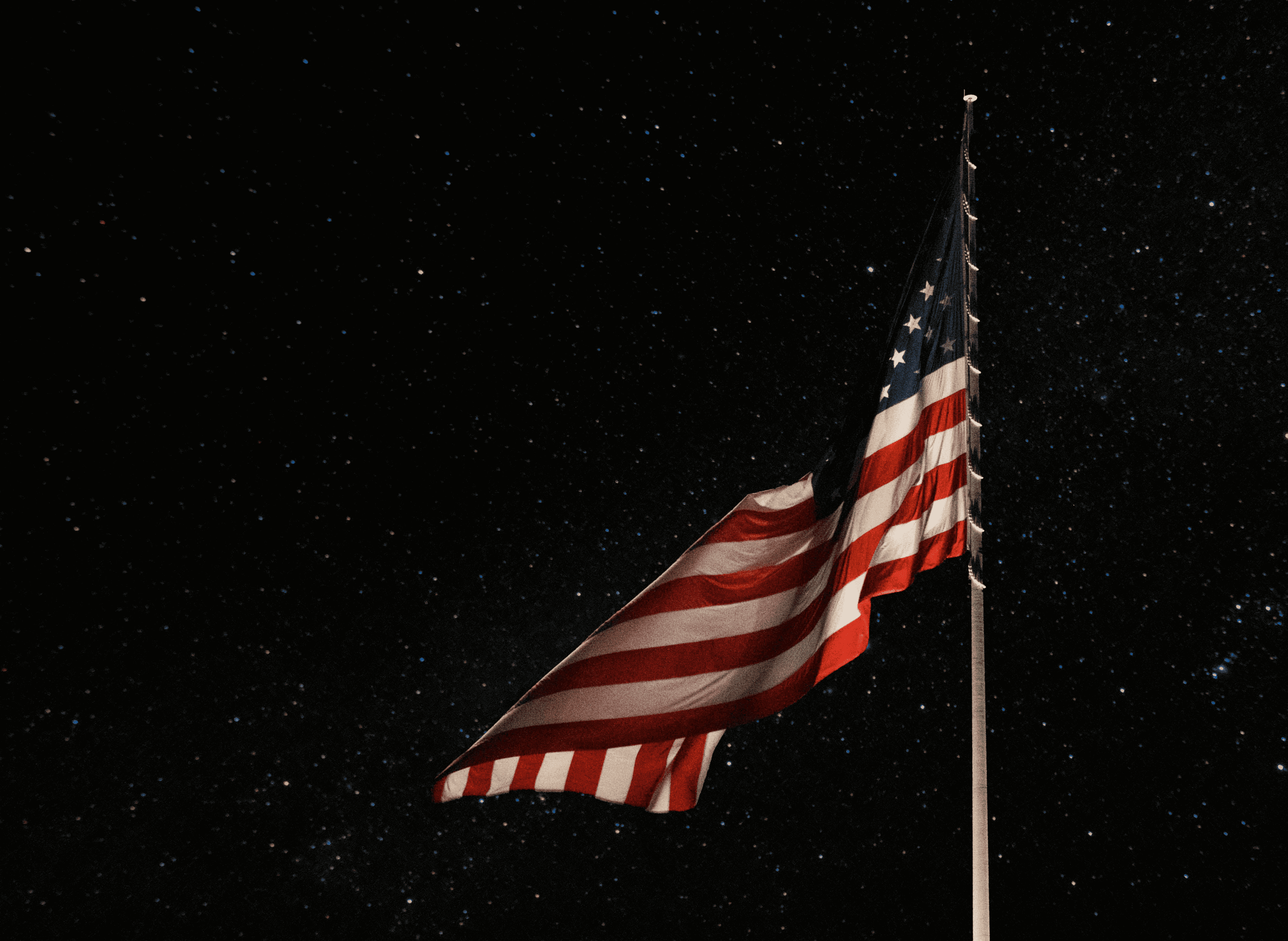 american flag with solar flag pole lights