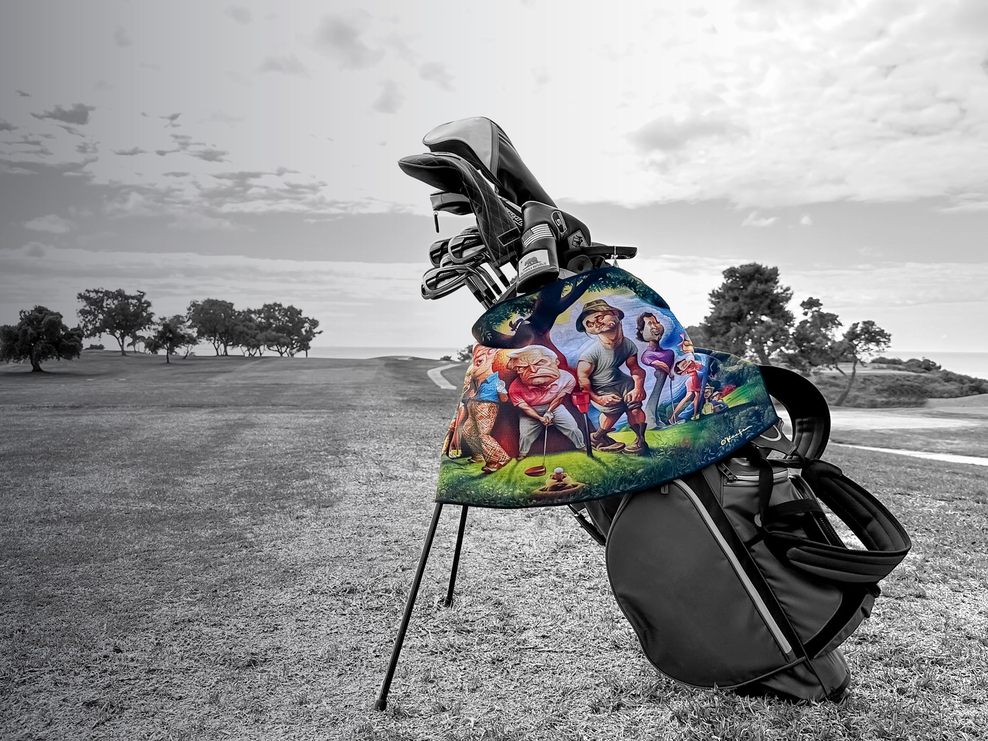 Caddy Shack Golf Towel by Devant shown on a golf course with a bagboy golf bag.